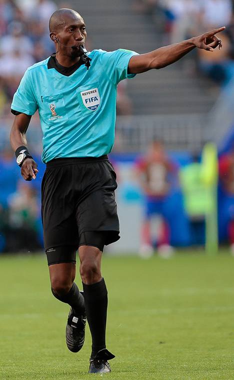 A soccer referee on the field